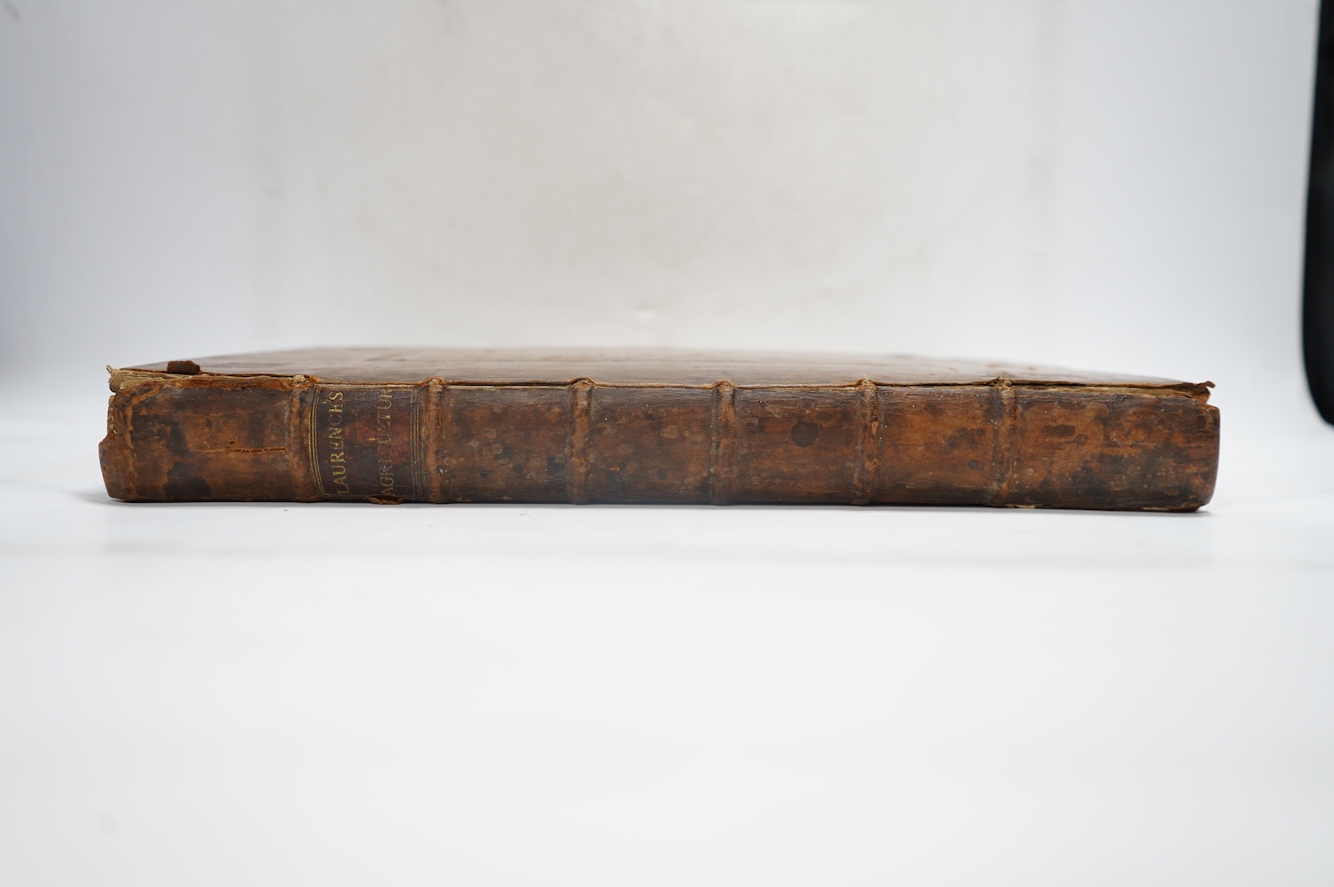 Laurence, John - A New System of Agriculture. Being a complete body of husbandry and gardening....1st edition. frontis. 2 plates, engraved text illus., head and tailpiece decorations; contemp. blind decorated panelled ca